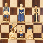 A collection of hand-painted chess pieces depicting characters from the English Civil War, displayed on a chessboard.
During the Middle Ages the King of England ruled and governed with the advice of the great barons of the realm.
This led to a civil war, which determined the fate of how England was to be ruled.
Our Civil War chess set attempts to portray the two opposing sides dressed in the costume of the period.